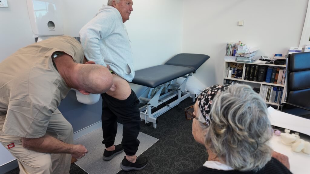 Dr Darren assessing hip joint